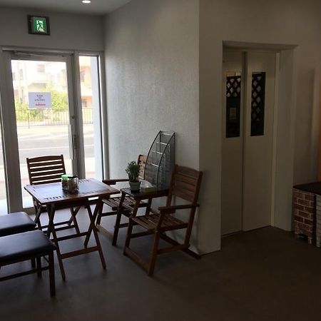 غينوان Mr Kinjo In 西原インター المظهر الخارجي الصورة