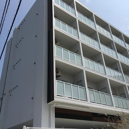 غينوان Mr Kinjo In 西原インター المظهر الخارجي الصورة